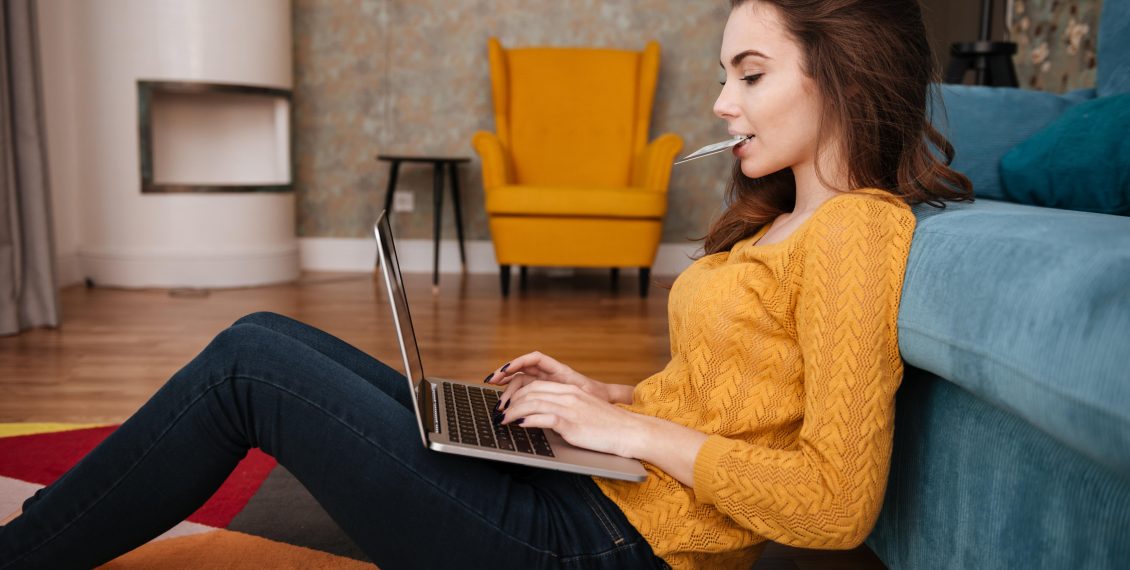 Portrait of a young woman doing shopping online